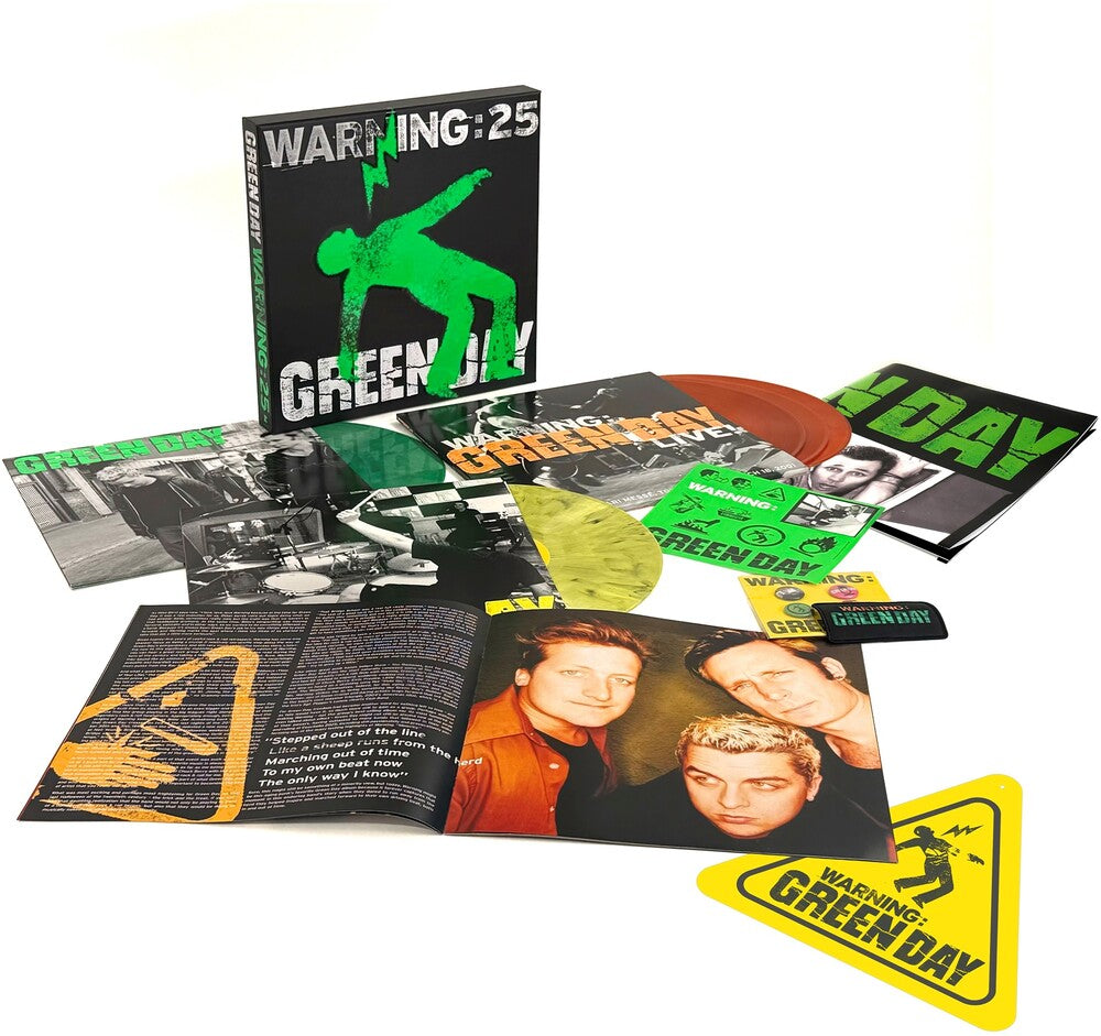 the album cover for Green Day - Warning (25th Anniversary Deluxe Edition) [Indie Exclusive Vinyl Box - Green, Yellow, and Orange LP]