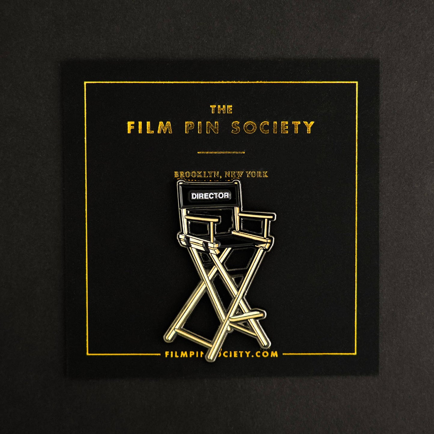 Director's Chair Enamel Pin