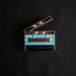 Glow in the Dark Movie Slate Clapper Enamel Pin