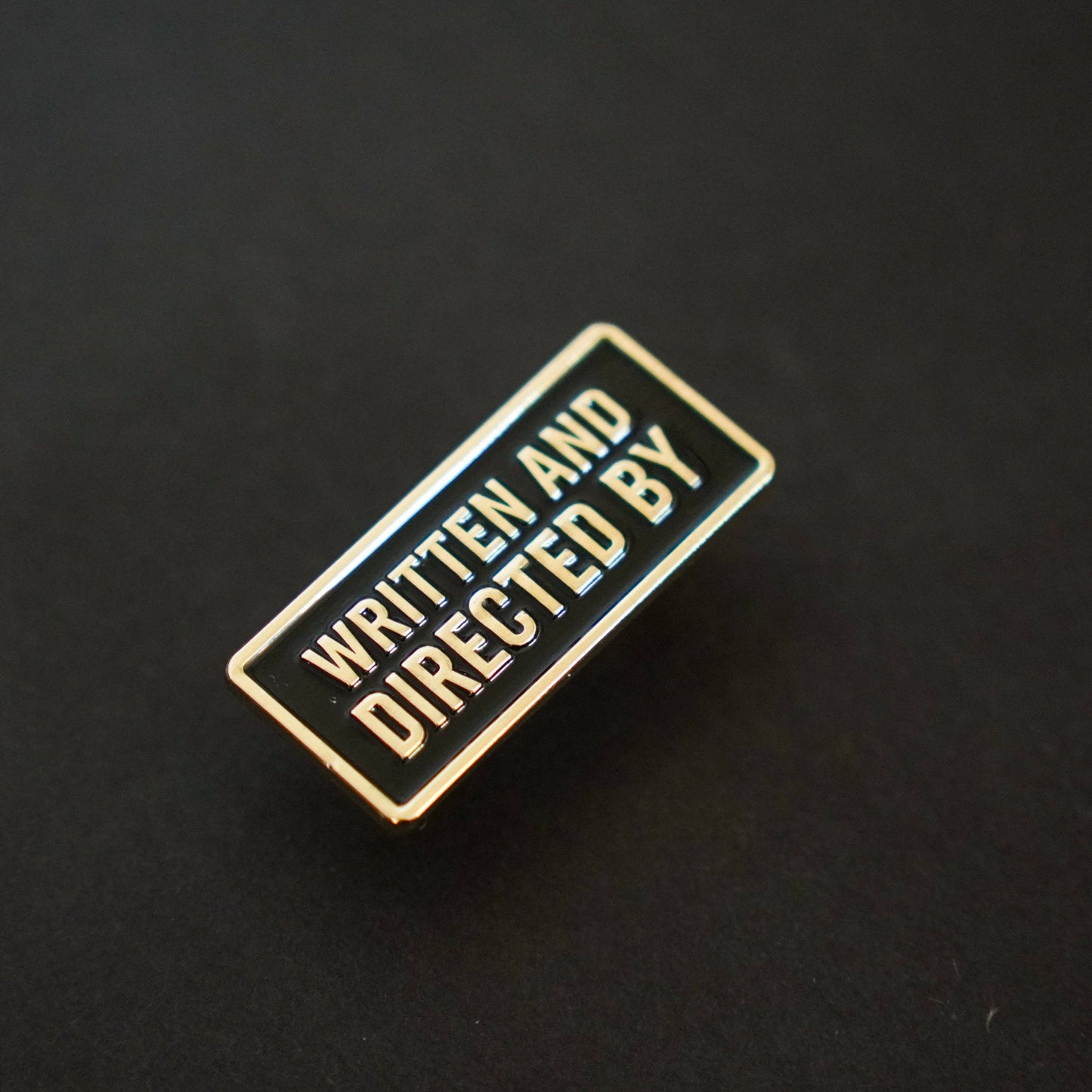 Written and Directed by Credit Enamel Pin