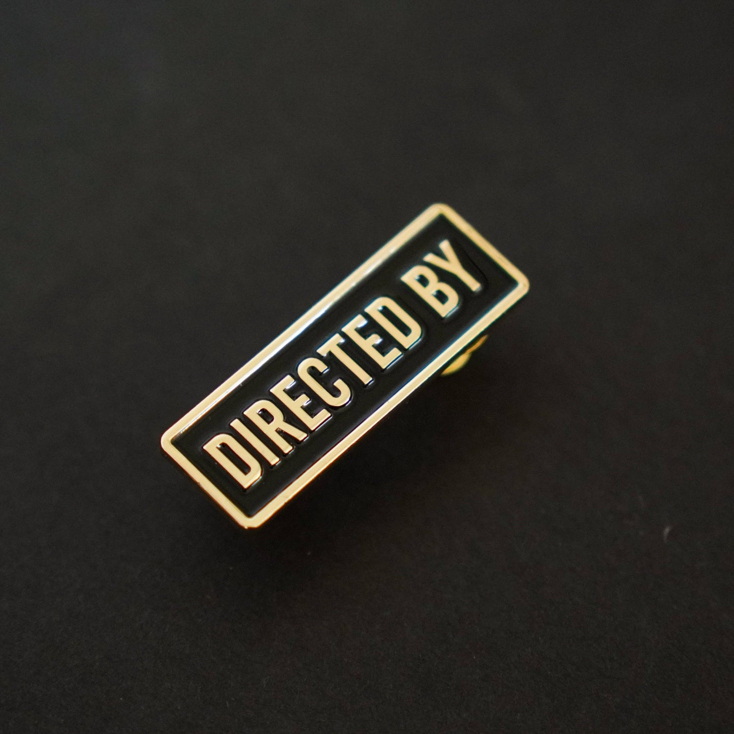 Directed by Credit Enamel Pin